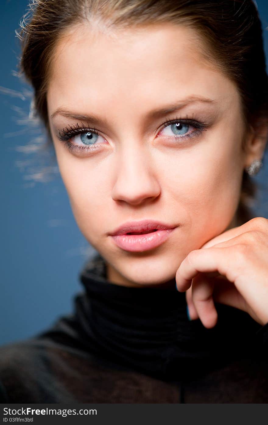 Portrait of a young attractive woman in a black jacket. Portrait of a young attractive woman in a black jacket