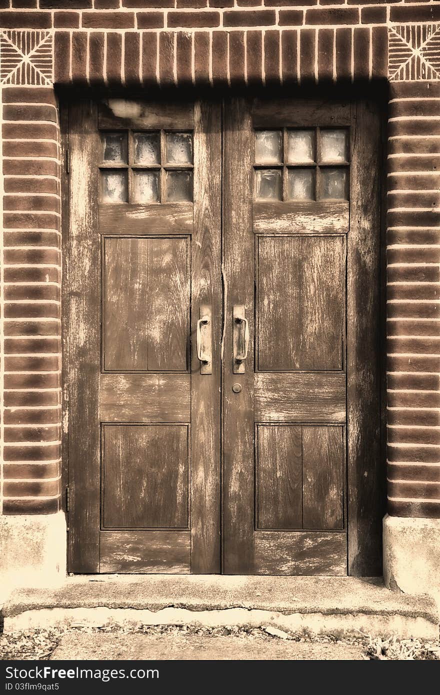 Door of an old building in London with sepia tones