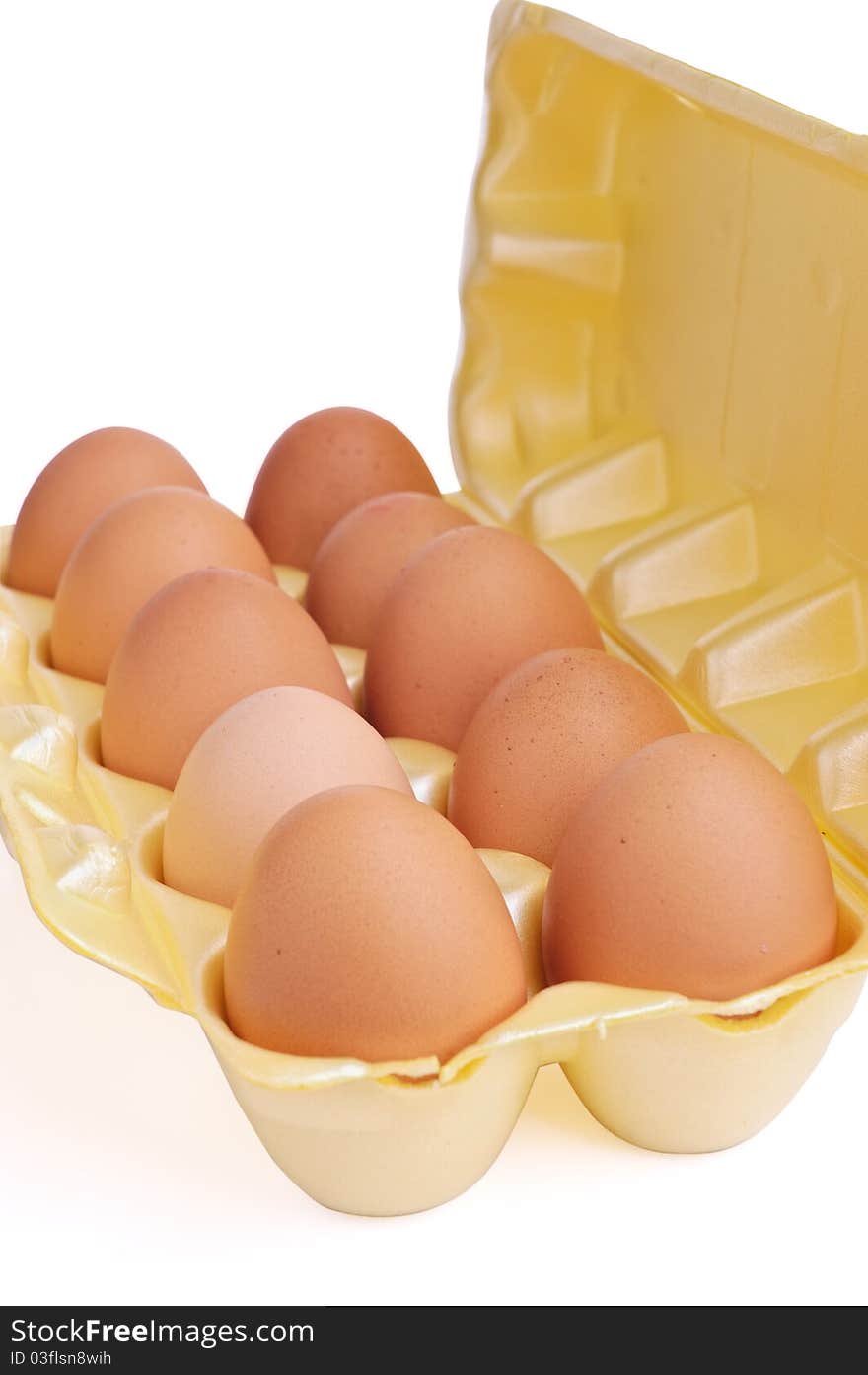 Eggs in packing from a cardboard on a white background.