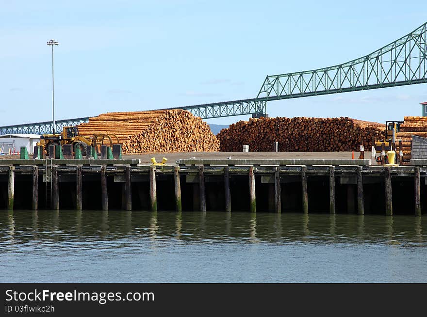 Logs are sorted and piled for export in Astoria OR. Logs are sorted and piled for export in Astoria OR.