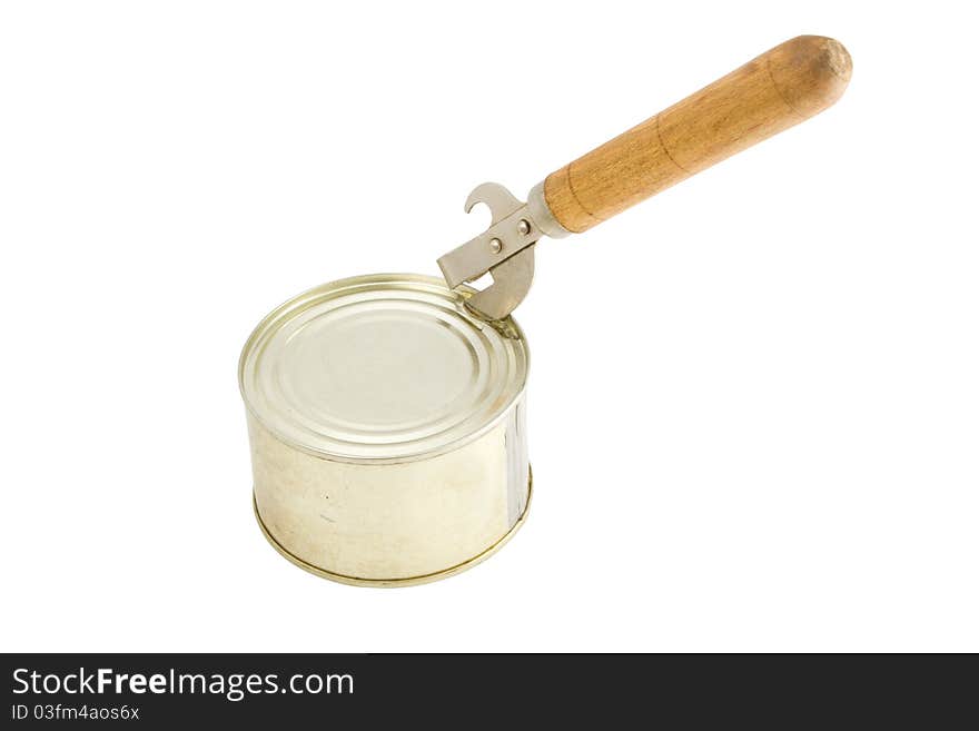 A metal tin of food with a tin opener in the process of opening the tin. A metal tin of food with a tin opener in the process of opening the tin.