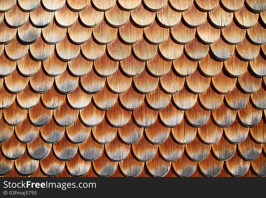 Wooden tiles on house in austrian alps