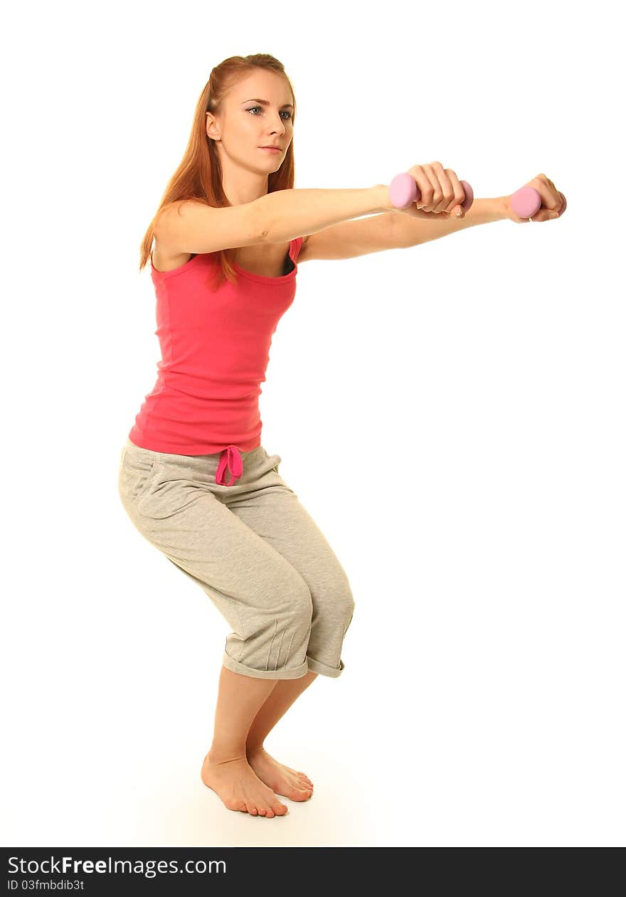 Beautiful young woman working out. Beautiful young woman working out