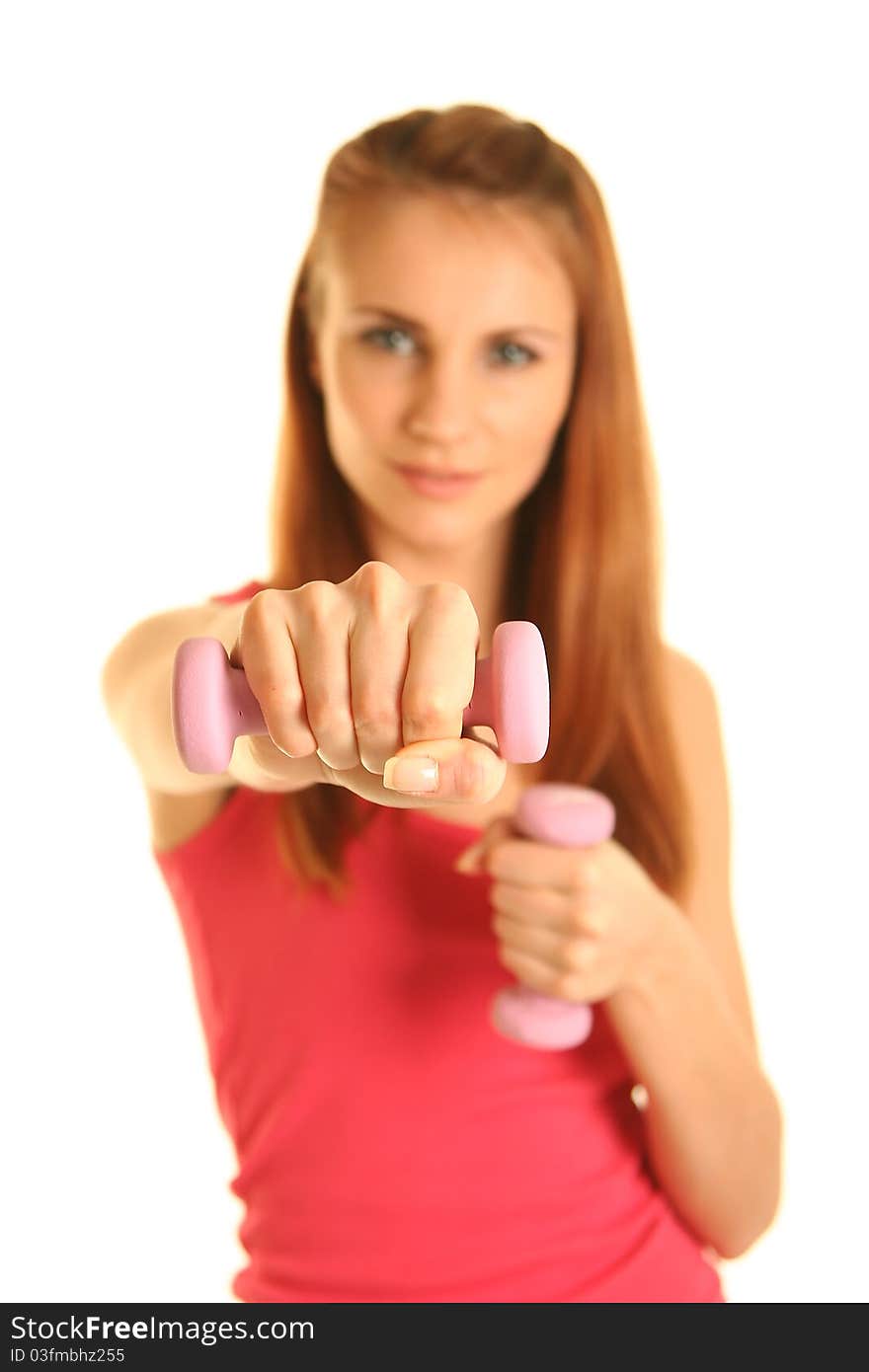 Beautiful young woman working out. Beautiful young woman working out