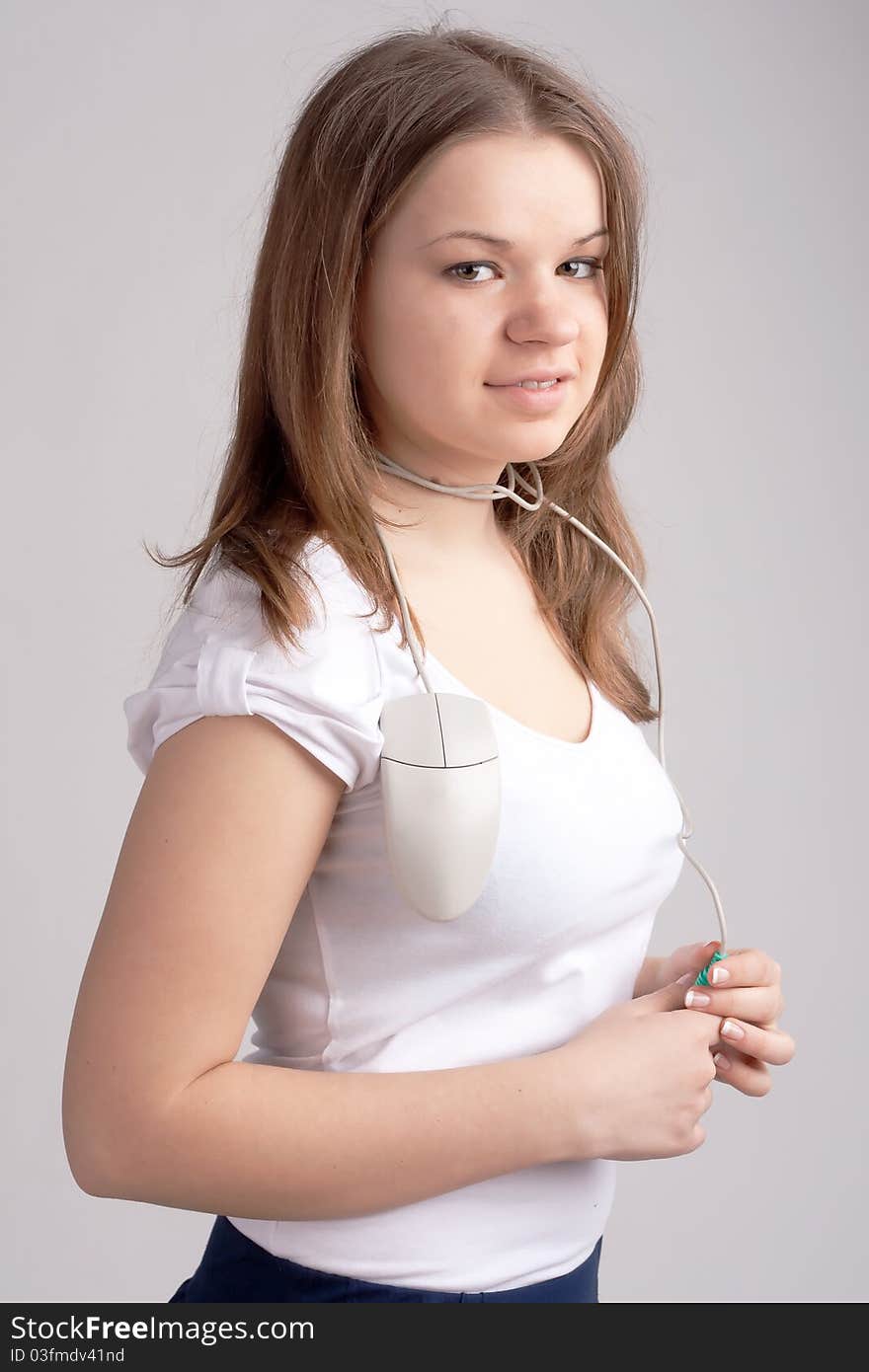 Girl with a computer mouse in the neck