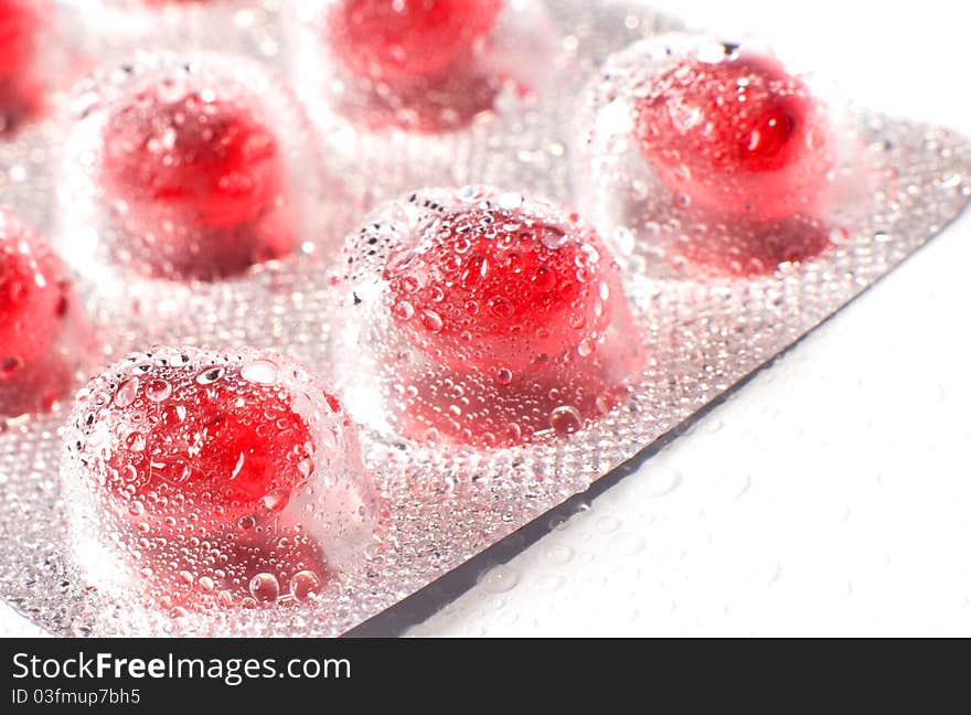 Blister packs of pills with water droplets