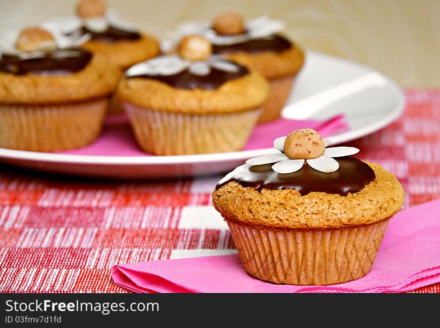 Five muffins on the table. Five muffins on the table