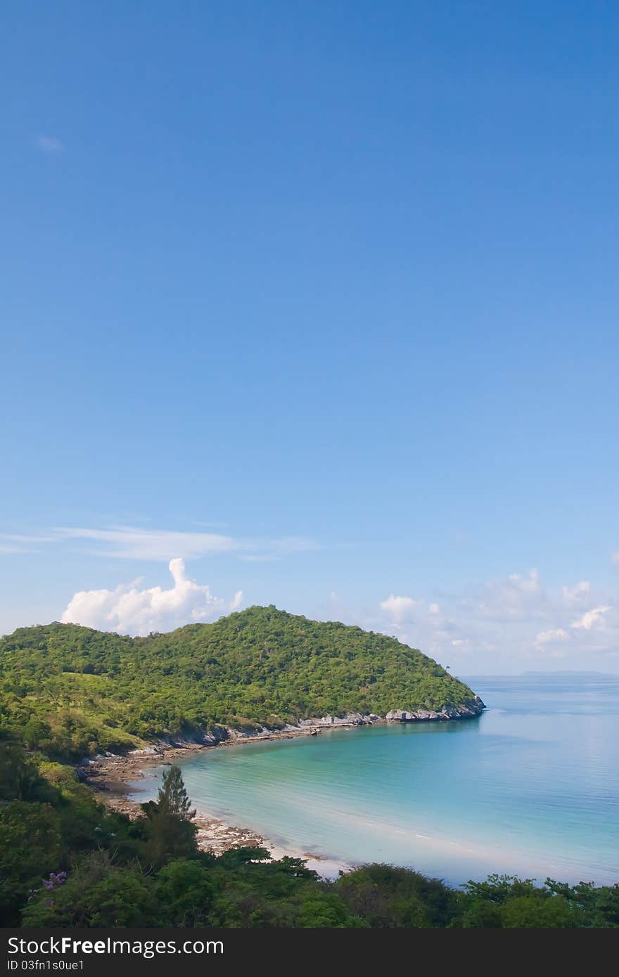 Beautiful coast on the left and blue sky from beach in Thailand vertical style. Beautiful coast on the left and blue sky from beach in Thailand vertical style