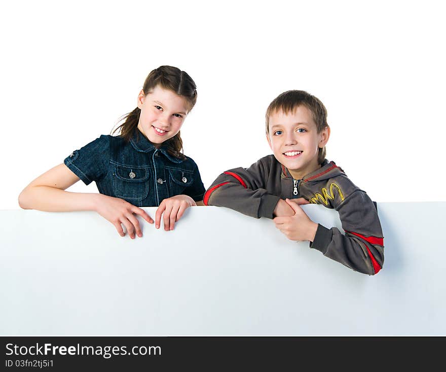 Two smily kids isolated over white background