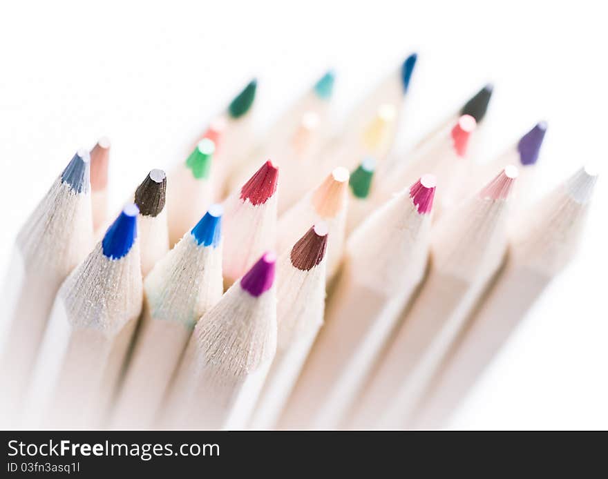 Colorful pencils bundled, on white background