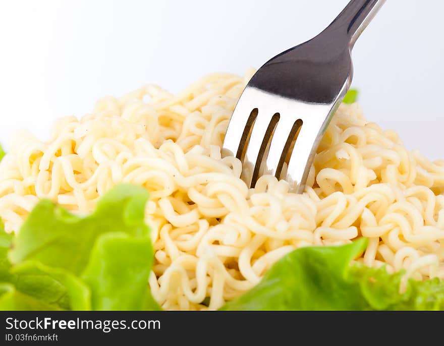 Vermicelli and lettuce. Isolated on a white bachground