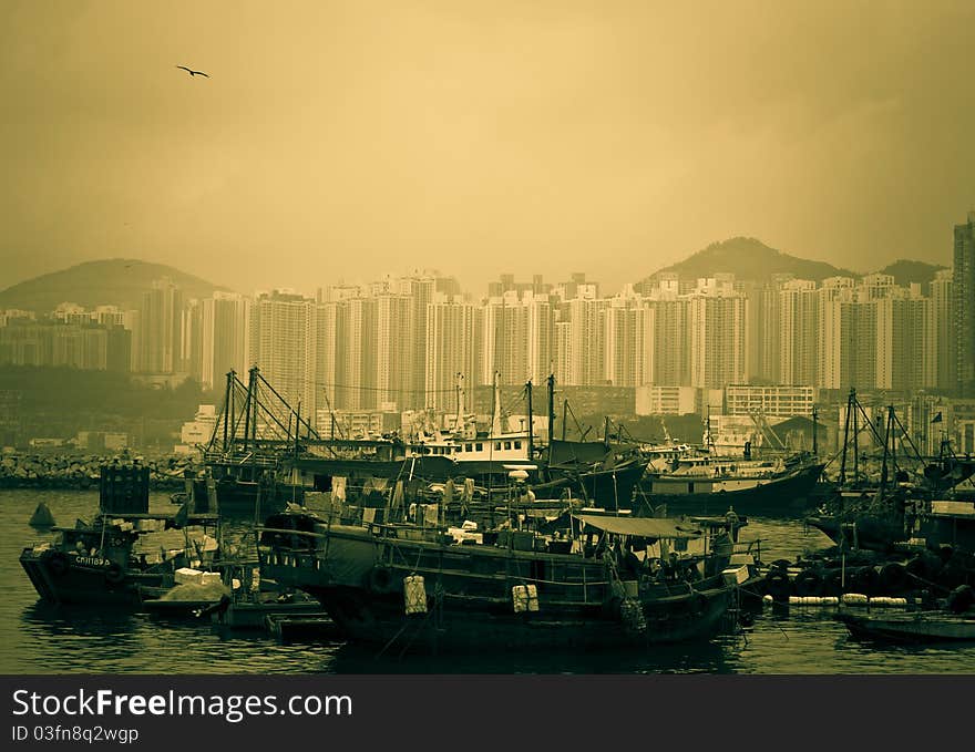 A scene of Hong Kong Typhoon Shelter with boats, sampans and ships.