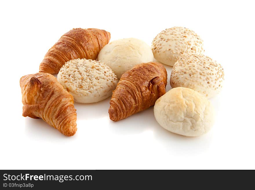 Different sorts of bread isolated over white background