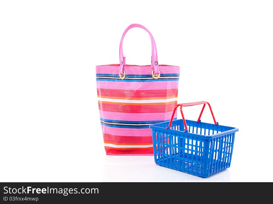 A shopping basket and a shopping bag isolated over white. A shopping basket and a shopping bag isolated over white