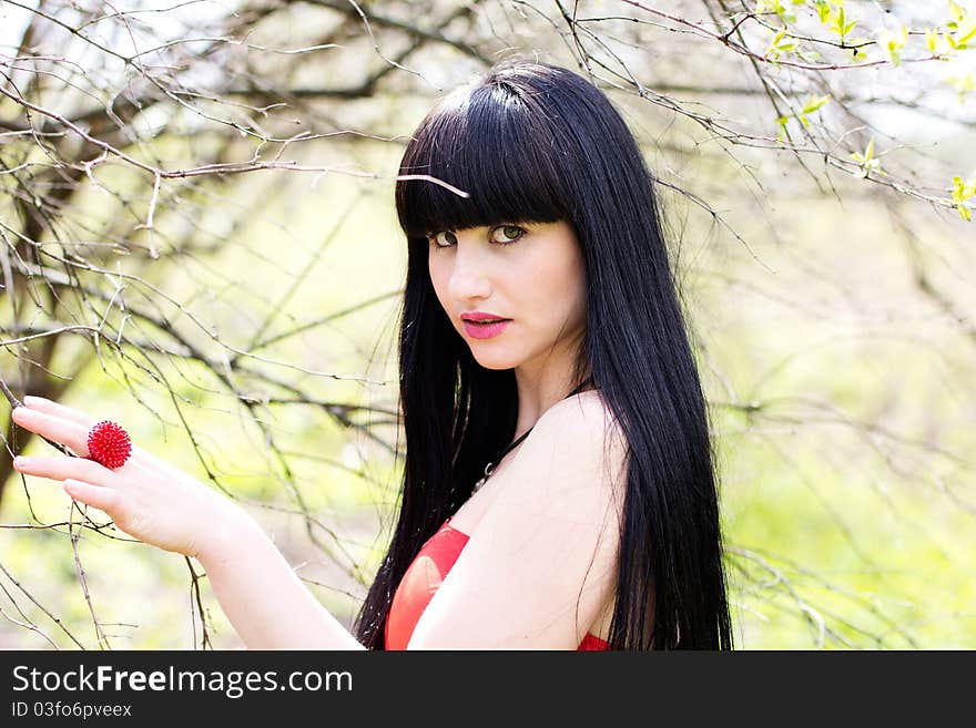 Beautiful young woman relaxing at the park