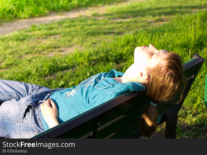 Young beautiful woman relaxing outdoor