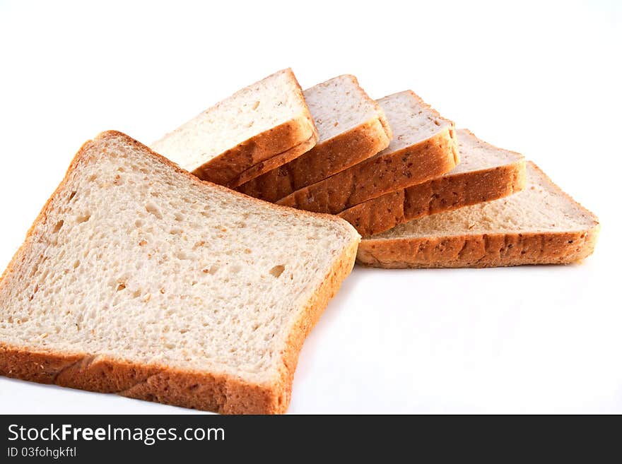 Whole wheat bread isolated on white