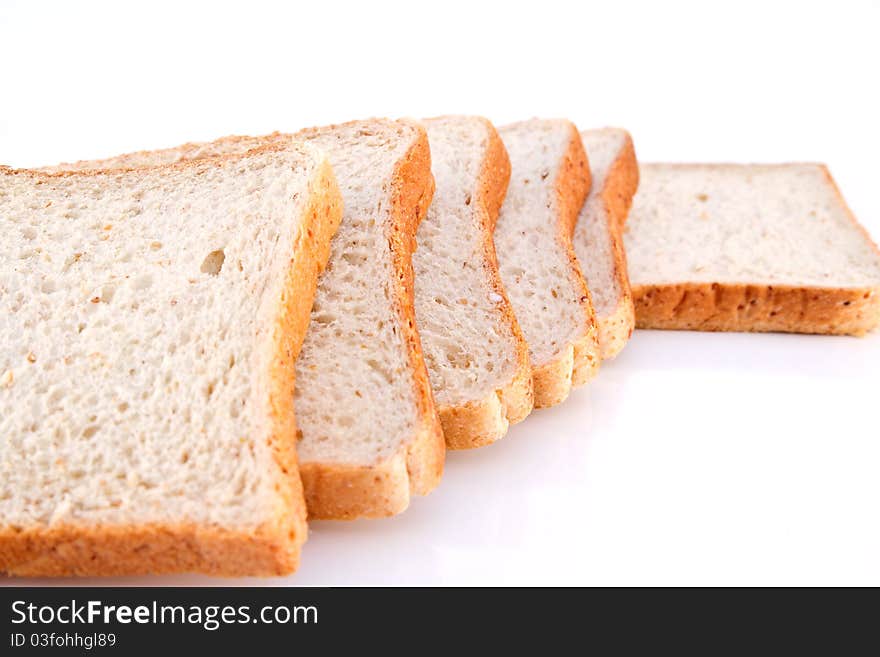 Whole wheat bread isolated on white background