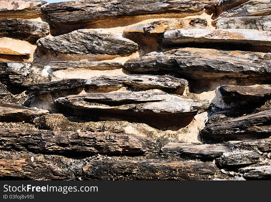 The close-up of the rough stone texture