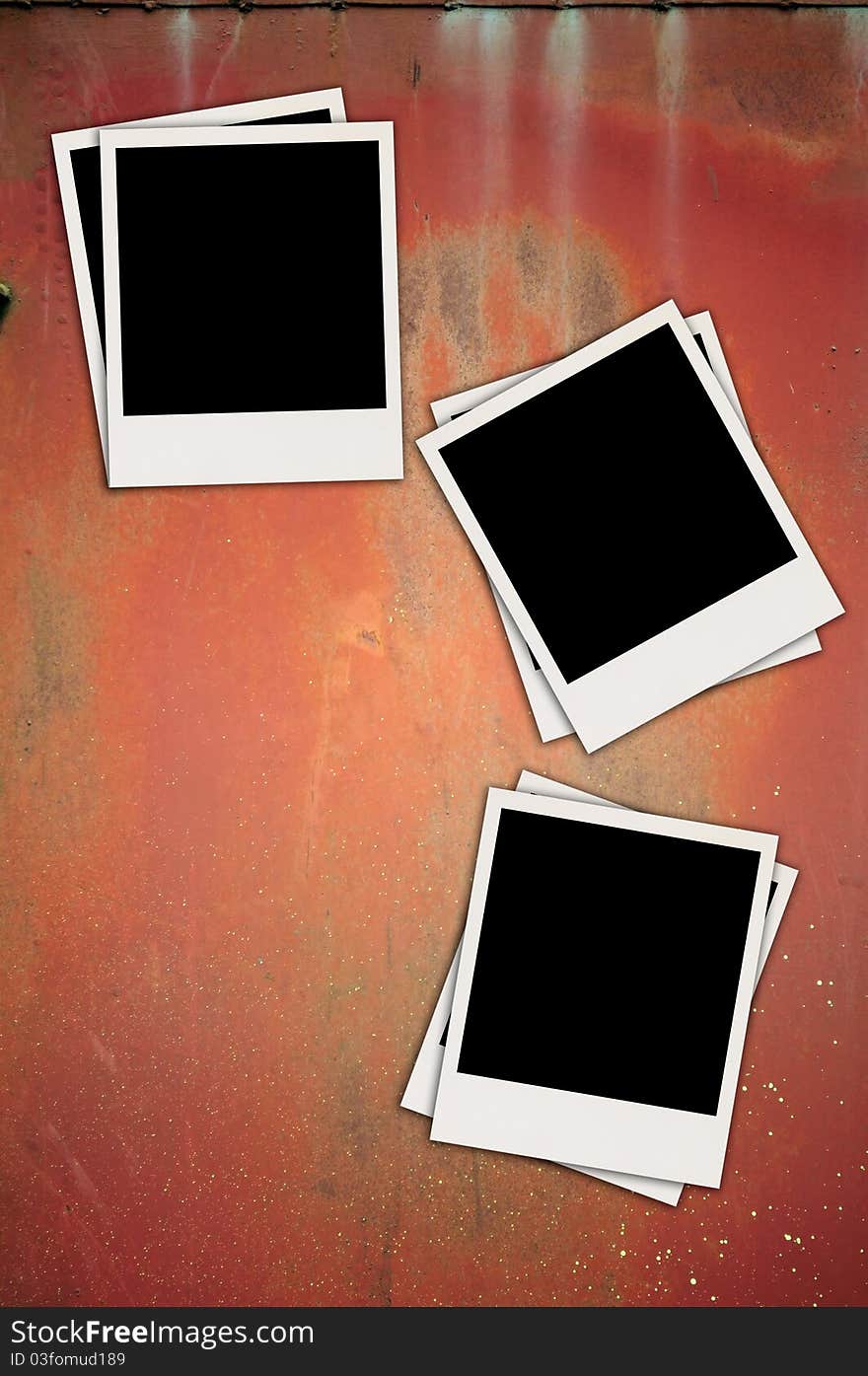 Three blank photos on a metal background with copy space. Three blank photos on a metal background with copy space