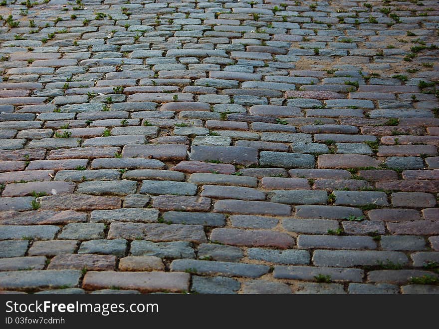 Old stone pavement background in Riga, Latvia