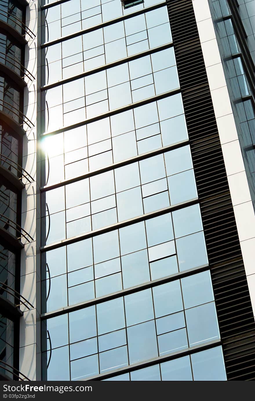 Commercial building exterior glass, the sun dipped