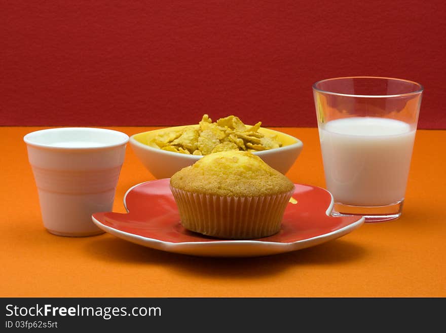 Muffin, cereal and milk