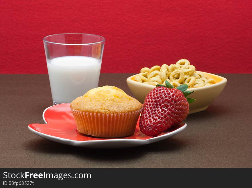 Muffins, cereal and milk for breakfast. Muffins, cereal and milk for breakfast