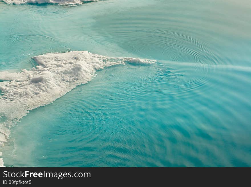 The water is absolutely pure and blue in Arctic. The water is absolutely pure and blue in Arctic.