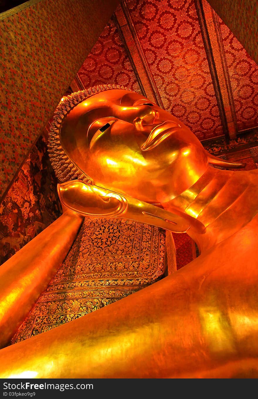 The Golden Reclining Buddha In Thailand