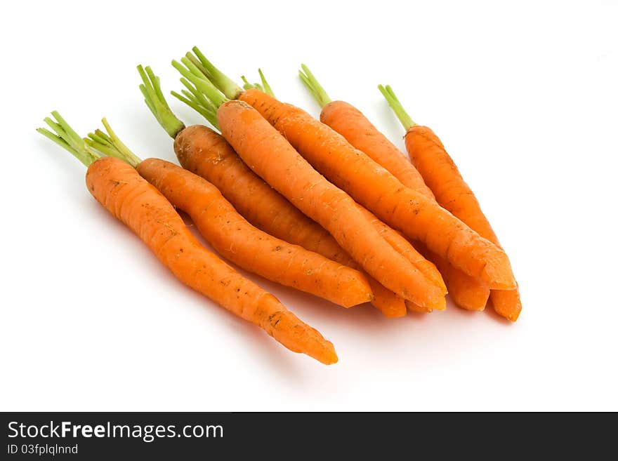 Pile of carrots over white