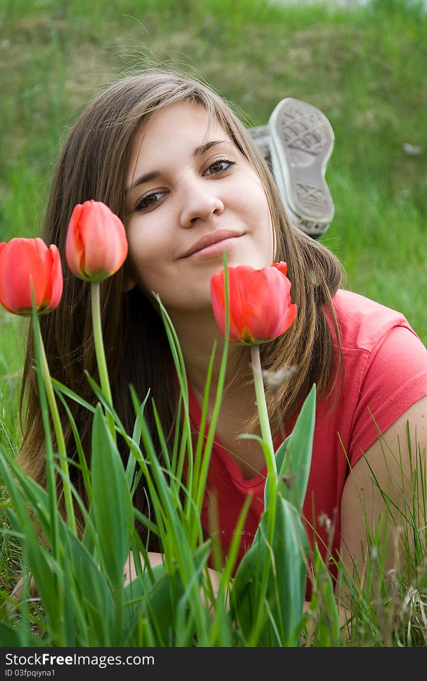 Young girl and tulips