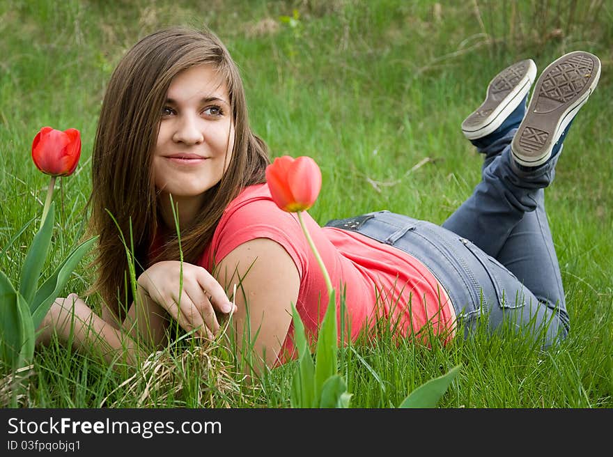 Young Girl And Tulips