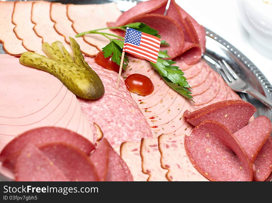 Plate of sausage with USA banner