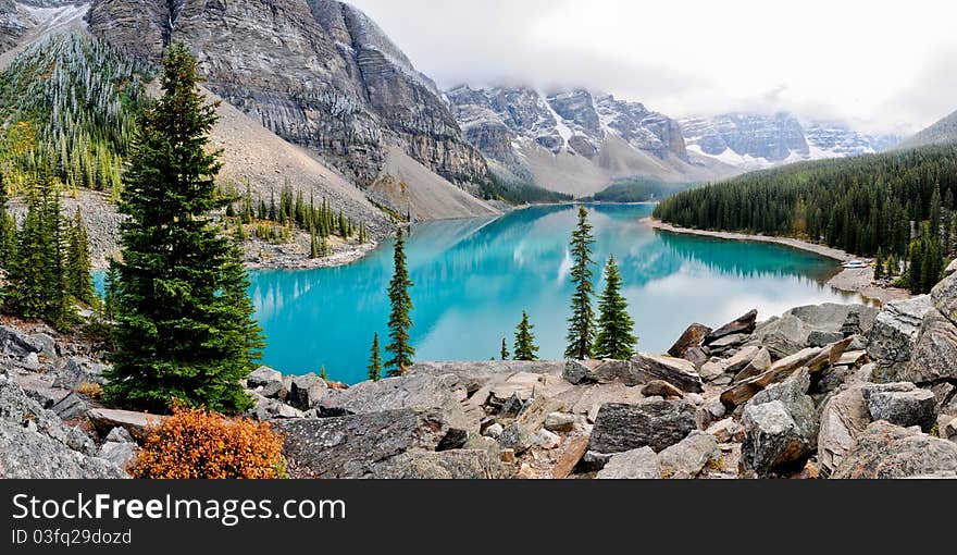 This photograph was taken in a national park in West-Canada. It's Morraine lake, one of the most photographed lakes in the world and is famous for it's blue-green color. This photograph was taken in a national park in West-Canada. It's Morraine lake, one of the most photographed lakes in the world and is famous for it's blue-green color