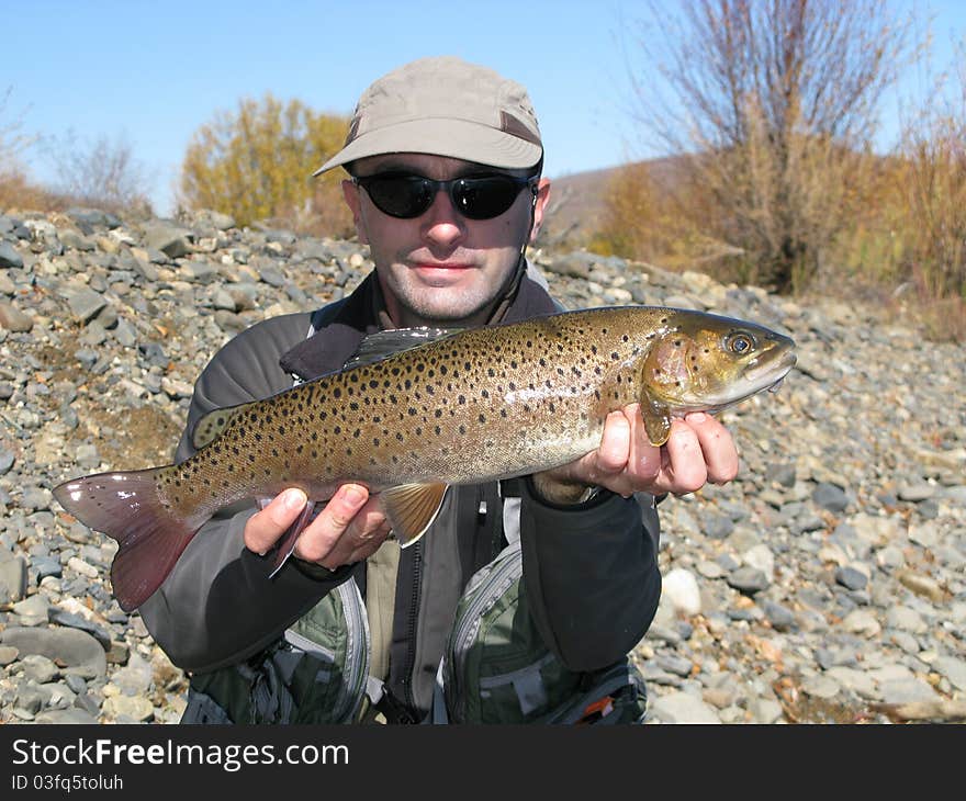 Fishing - fisherman catched big trout