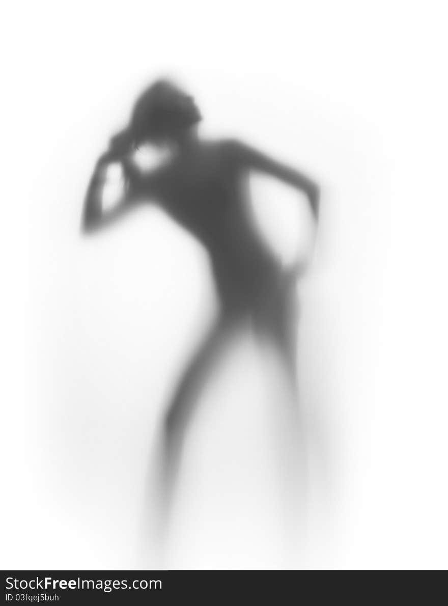 Nice woman pulls her hair, silhouette