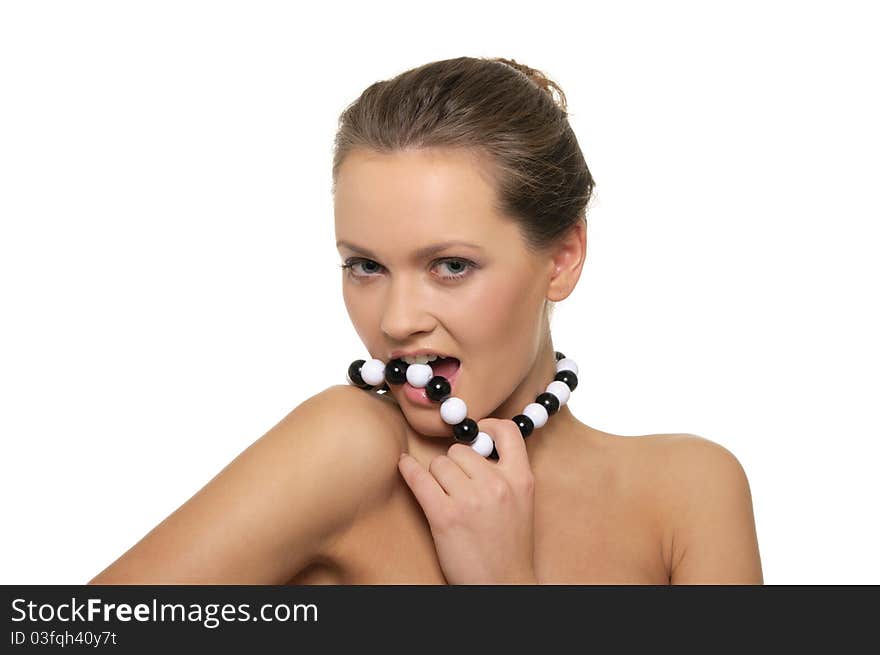 Beautiful woman with black and white beads isolated on white