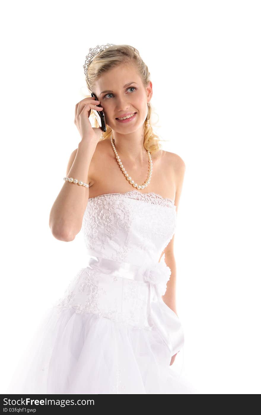 Happy bride with mobile phone