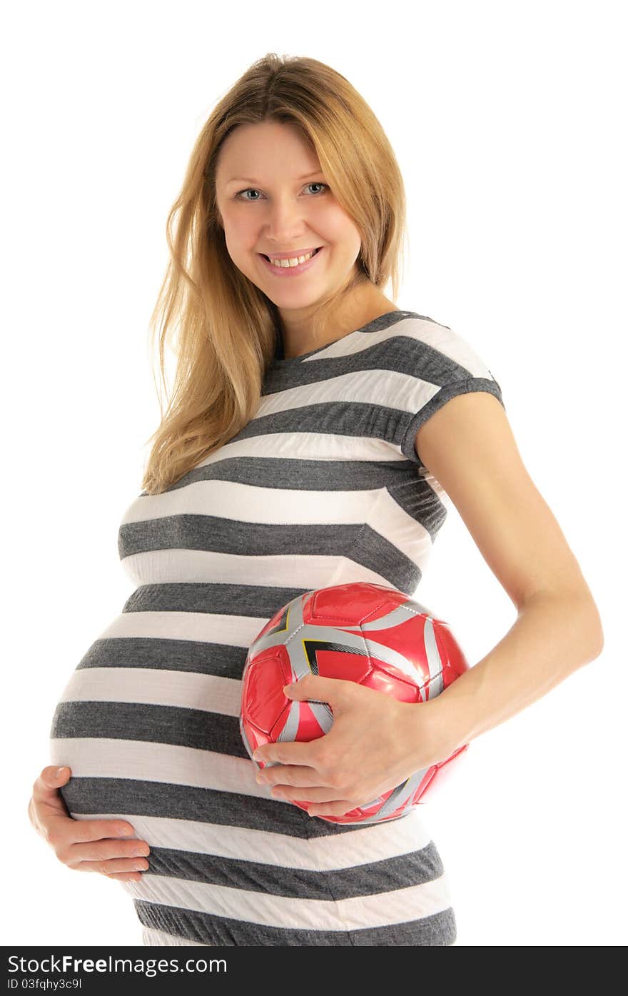 Pregnant woman with soccer ball