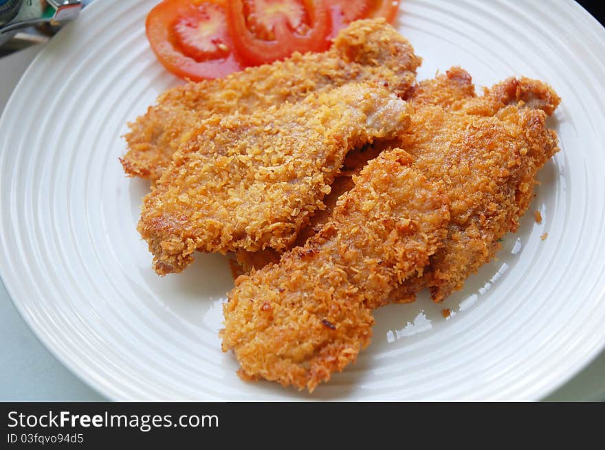 Image of pork chop on plate