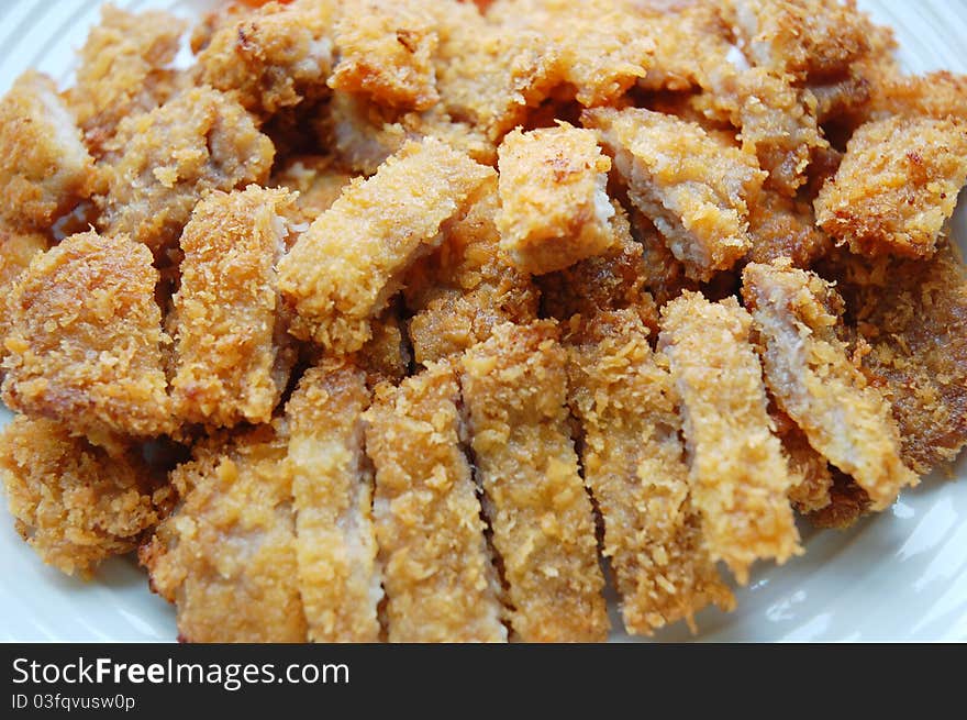 Image of pork chop on plate. Image of pork chop on plate