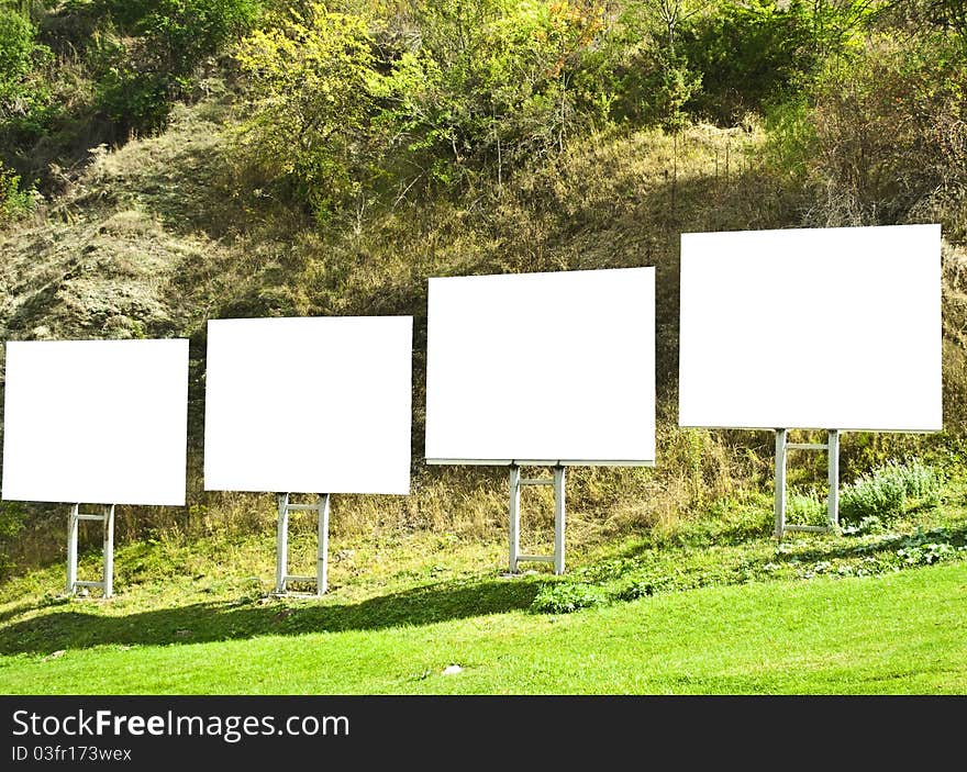 Blank billboards on green field. Blank billboards on green field