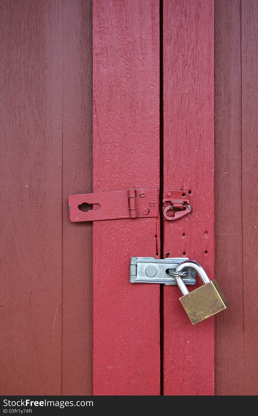 Red wooden door with lock. Red wooden door with lock