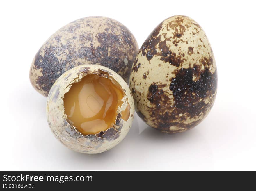 Isolated broken partridge egg