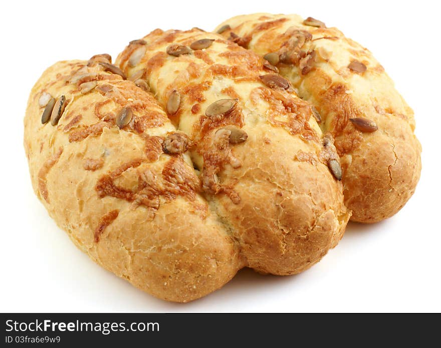 Loaf of corn bread with pumpkin seeds on white background. Loaf of corn bread with pumpkin seeds on white background