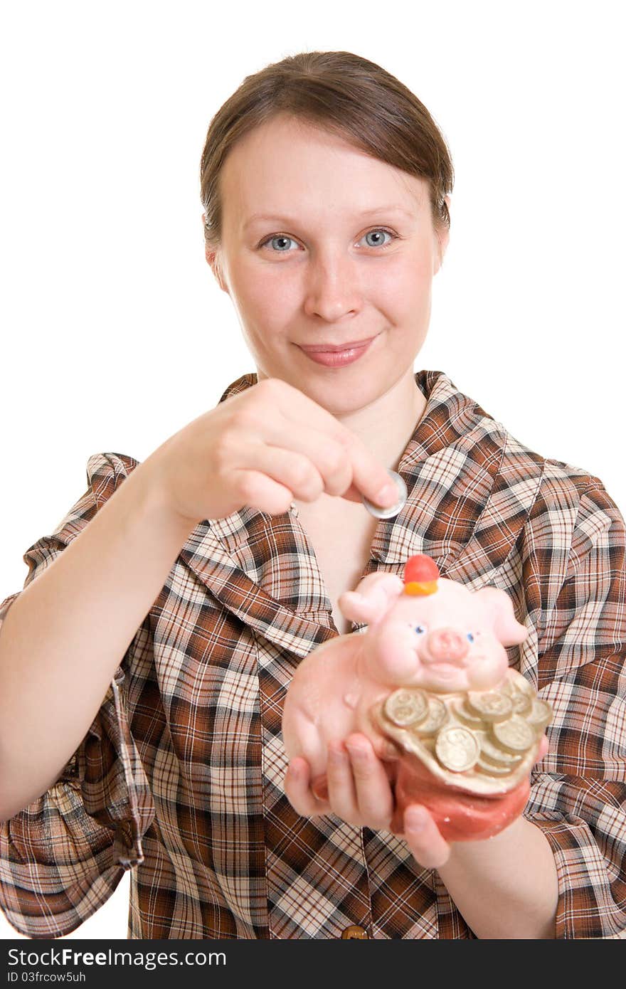 Woman with piggy bank on white background.