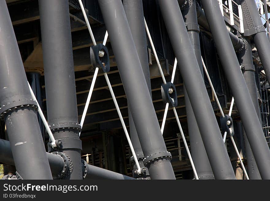 Steel Legs supporting a large industrial structure. Architecture from victorian era