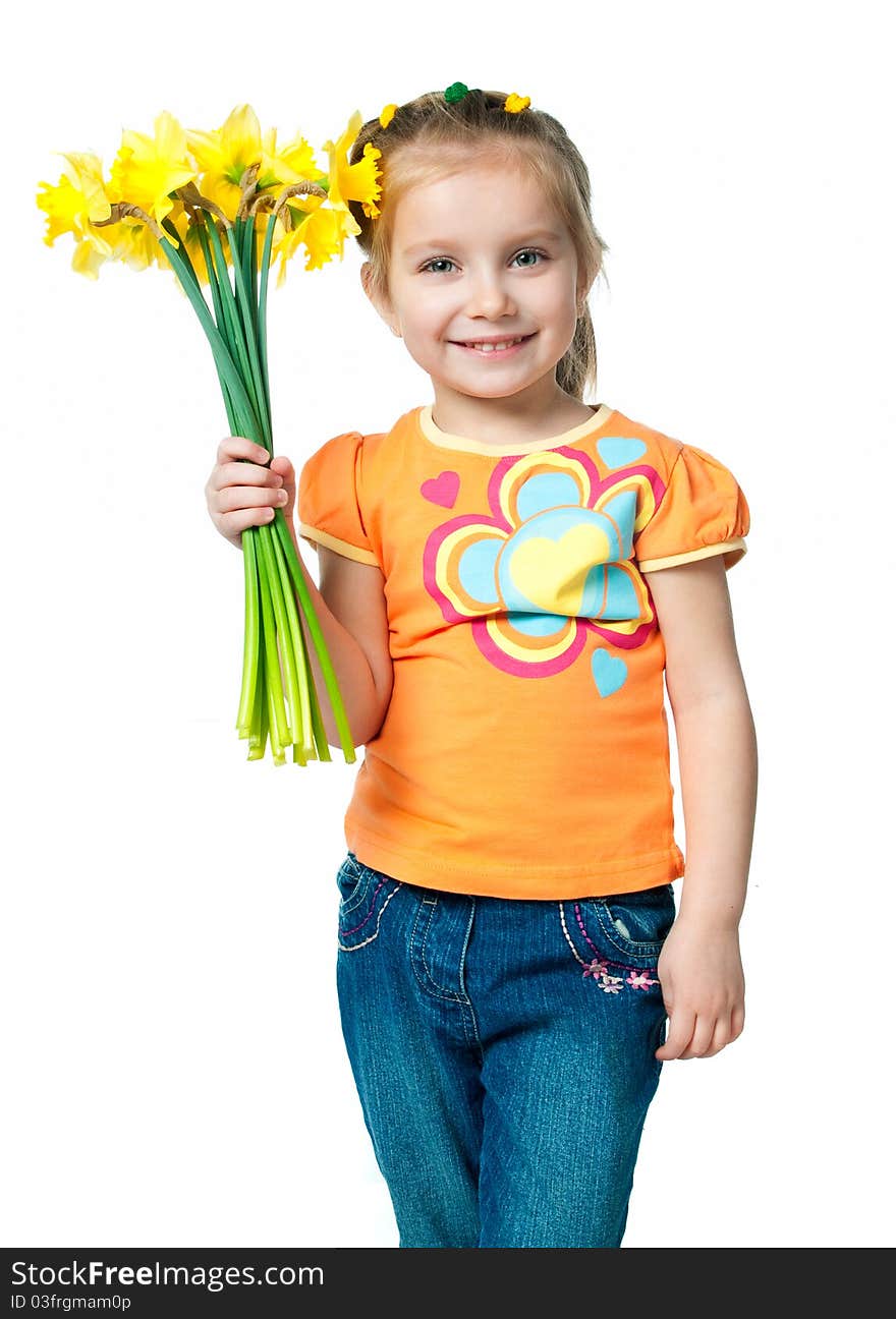 Beautiful little girl with a bouquet of daffodils. Beautiful little girl with a bouquet of daffodils