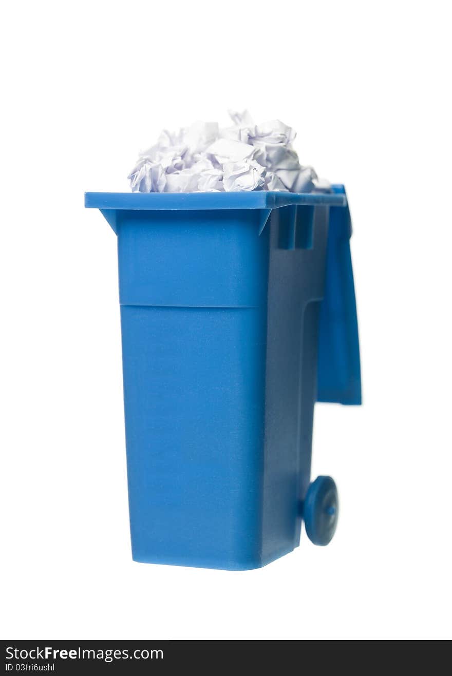 Recycling bin with paper